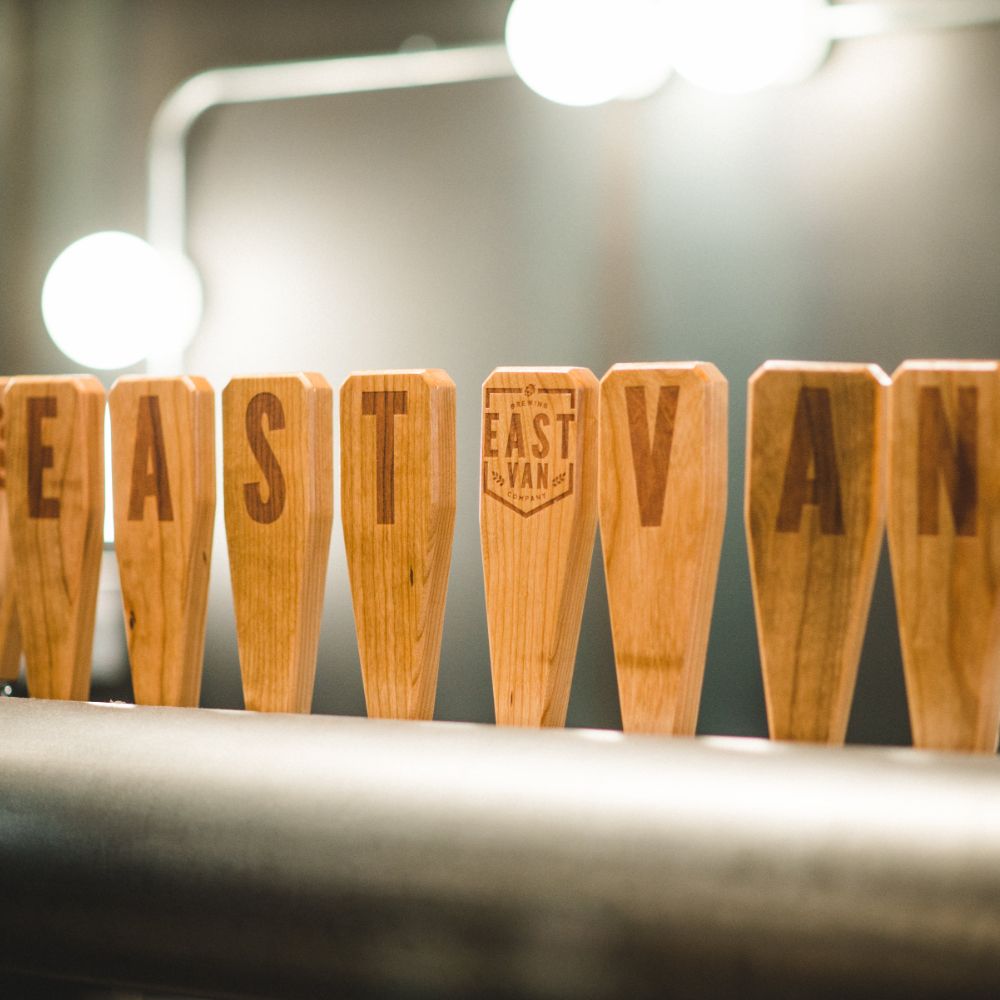 beer tap handles spelling out East Van